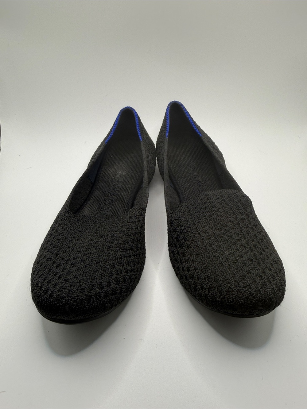 Rothy's Black Knit Slip-On Flats with Blue Trim